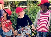 Group of kids school field trips learning outdoors botanic park