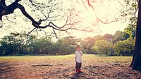Boy is standing in the park