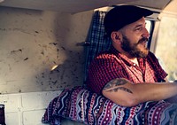Man Sitting in  a Van Happiness With Friends