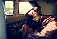 Woman Sitting in a Van Roadtrip