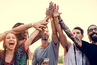 Group of Friends and Beers Enjoying Music Festival together
