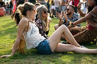 People Enjoying Talking Together at Music Concert Festival