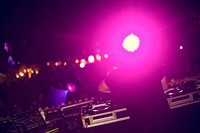 DJ Using Tuner Make Musics in Festival