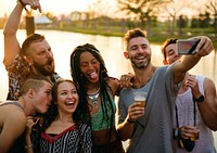 Group of Diverse Friends Enjoying Taking Selfie Photo at Live Music Concert Festival