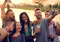 Group of Diverse Friends Enjoying Taking Selfie Photo at Live Mu