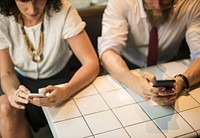 Business People using the phone at coffee shop