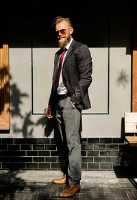 Confidence businessman in suit standing