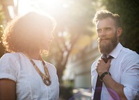 Business people talking together in the park