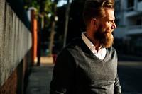 Man walking on footpath in the city