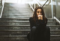 Woman Sitting Look Worried on The Stairway