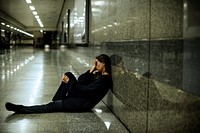 Woman Sitting Hopeless on The Floor