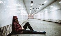 Adult Woman Sitting Hopeless on The Floor