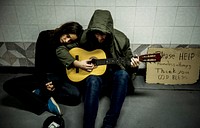 Homeless Couple  Playing Guitar Asking For Money Donation