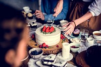 Woman cutting sweet cake to share for the party