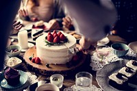 Woman cutting sweet cake to share for the party
