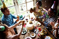 People Using Party Popper at a Birthday Celebration