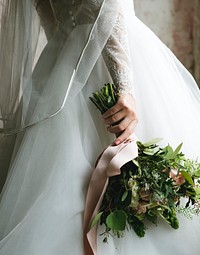 Closeup of a bride&#39;s bouquet of flowers