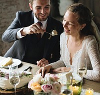 Groom Feeding Cake To Bride on Wedding Reception