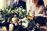 Restaurant Staff Poring Serving Wine to Customers