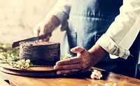 Baker Man Using Spatula Making Chocolate Cake
