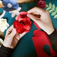 People making paper craft flower art