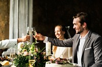 People Cling Wine Glasses on Wedding Reception with Bride and Groom