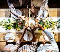 Wedding party having a toast at a wedding table