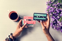 Hands Hold Showing Retro Music Audio Cassette Tape 80s