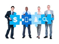 Group of Business People Holding Puzzle Pieces Different Icons