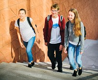 Group of students walking in the school