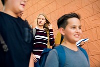 Group of students walking in the school