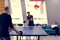 People break playing table tennis relax