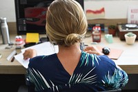 Caucasian woman working at the office