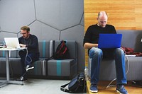 Caucasian men using computer laptop