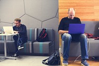 Caucasian men using computer laptop