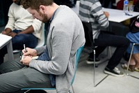 Startup Business People Writing on Notebook