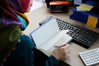 Muslim woman working at the office