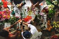 Group of people decorate the flower
