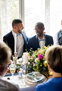 Cheerful Gay Couple in Wedding Reception