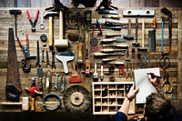 Aerial view of carpenter man with working tools equipment set