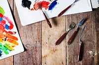 Painting tools on a wooden table and copy-space