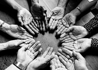 Diverse hands in a circle 