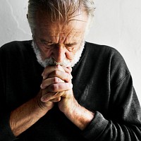 Senior man prayer faith in christianity religion