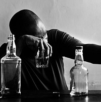 African American man drinking alcohol 