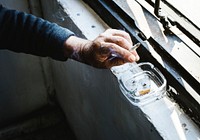 Closeup of cigarette and an ashtray