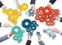 Group of Business People Holding Gears