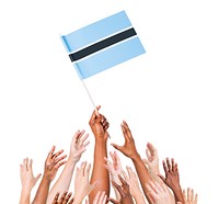 Group Of Multi-Ethnic People Reaching For And Holding The Flag Of Botwana