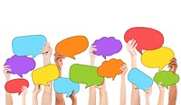 Multi-Ethnic Group of Hands Holding Speech Bubbles