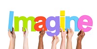 Diverse Group of Hands Holding Imagine