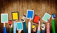 Group of Hands Holding Digital Devices with Copy Space